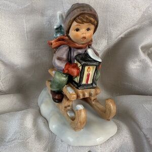 “Ride into Christmas” Hummel figurine.